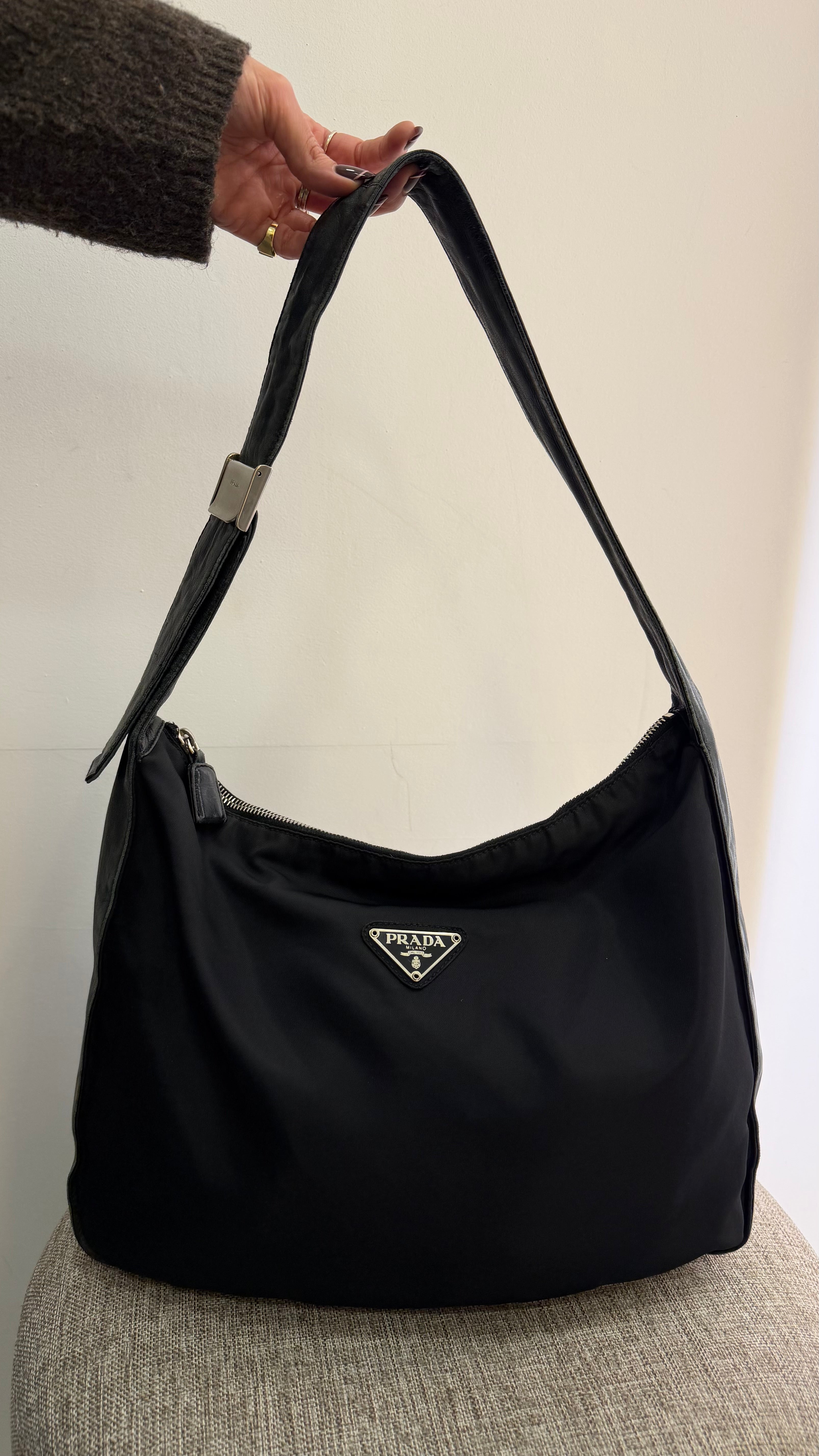 Bolsa preta Prada