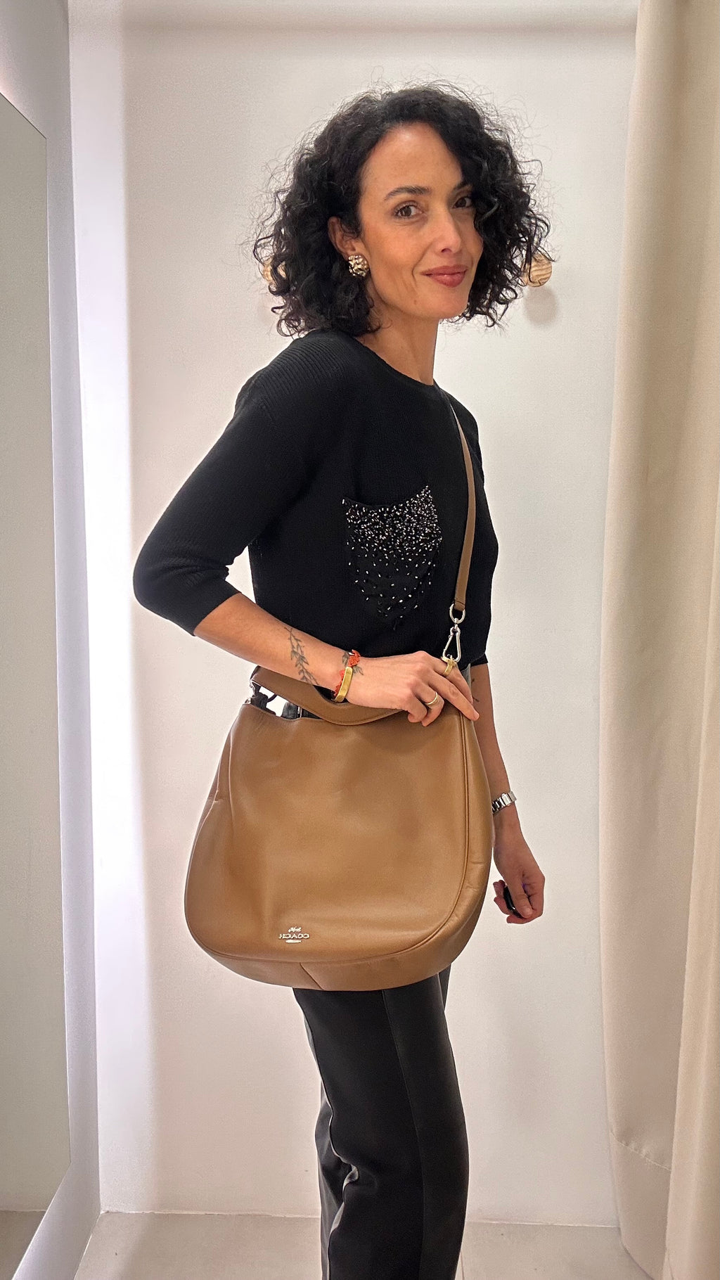 Bolsa couro Coach