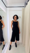 Macacão preto amarração Uniqlo