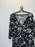 Macacão Floral Preto e Branco