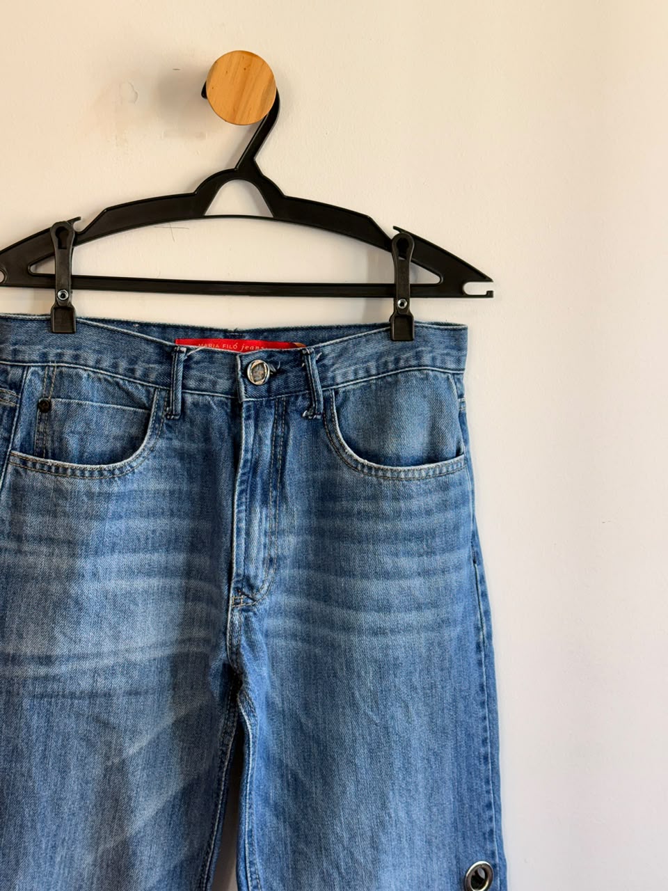 Calça Jeans com Ilhós Maria Filó